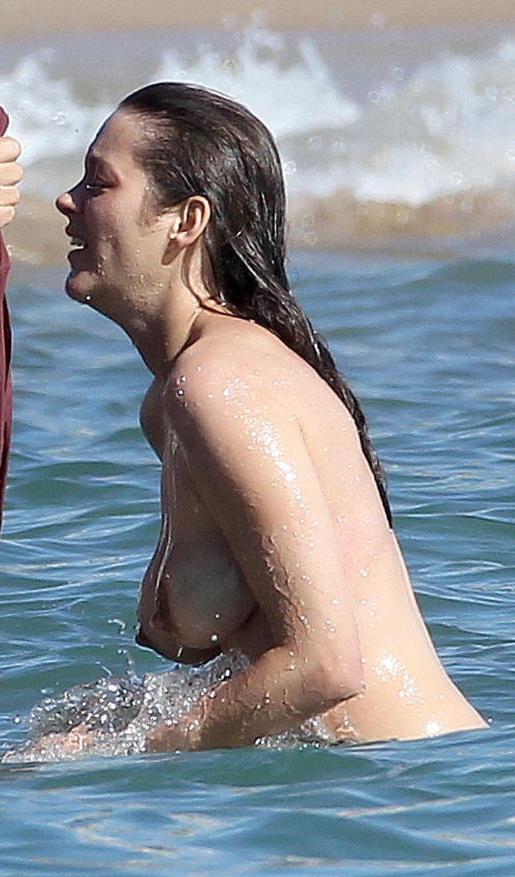 Busty-Marion-Cotillard-enjoying-a-topless-swim_001_big.jpeg